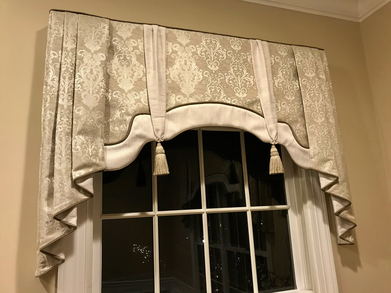 Custom valance window treatment in living room