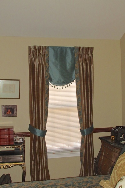 photo of custom balloon shade with pinch pleat drapes