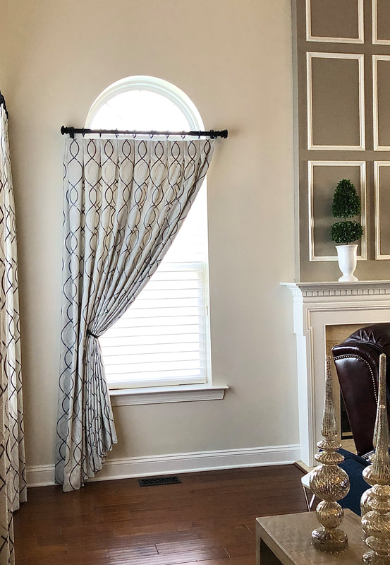 pinch pleat tied back curtains in family room