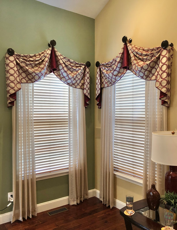 arched valance with sheer curtains swags and holdbacks