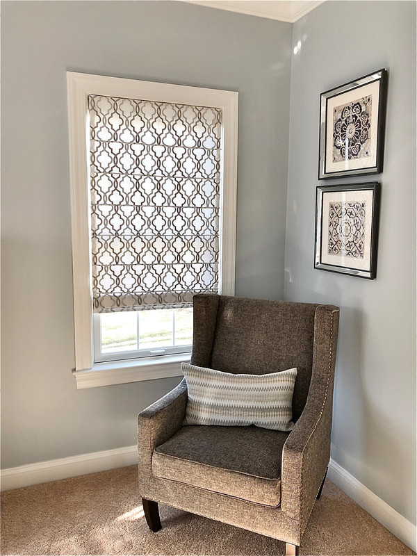 Ribbed roman shade with grey geometric fabric for master bedroom